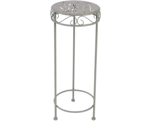 Stojan na kvety z kovu so vzorom na doske stola