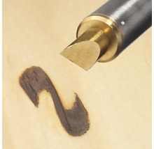 Drevoryt vytvára tmavú líniu na dreve