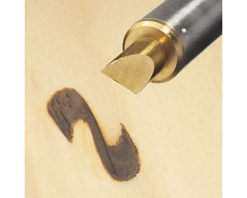 Drevoryt vytvára tmavú líniu na dreve