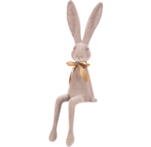 Dekoratívny zajac so stuhou ako veľkonočná dekorácia