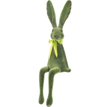 Dekoratívny zelený zajac s mašľou ako veľkonočná dekorácia
