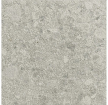 Detailný záber dlaždice s kamenným dekorom.