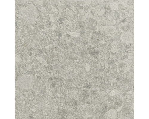 Detailný záber dlaždice s kamenným dekorom.