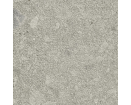 Detailný záber podlahovej dlaždice s kamennou štruktúrou