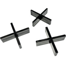 Tri čierne krížiky na obklady