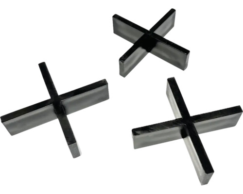 Tri čierne krížiky na obklady