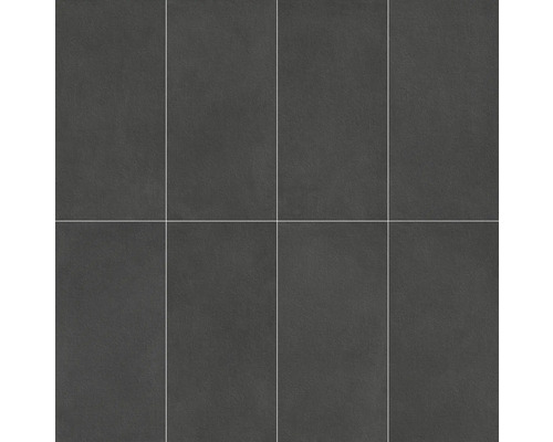 Obdĺžnikové, tmavé kameniny dlaždice, naskladané vedľa seba.