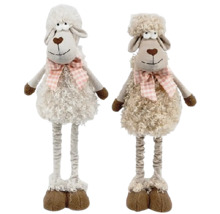 Dve plyšové hračky v tvare oviec s mašľami