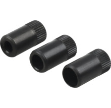 Tri ryhované kovové puzdrá