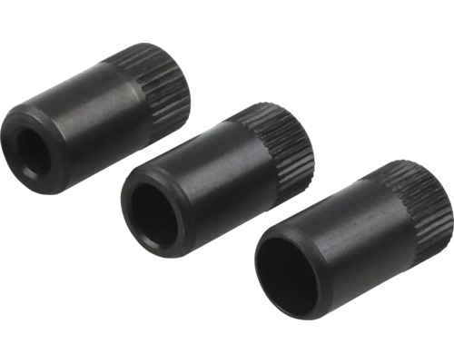 Tri ryhované kovové puzdrá