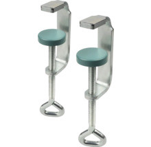 Dve kovové skrutkové zvierky s okrúhlymi prítlačnými taniermi a kruhovými rukoväťami.