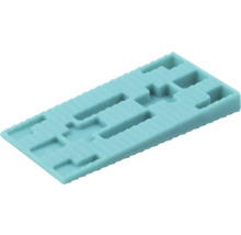 Obdĺžniková plastová podložka pod sklo s výrezmi pre presnú montáž okien a vyrovnanie nerovností.