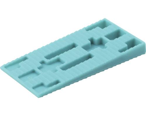 Obdĺžniková plastová podložka pod sklo s výrezmi pre presnú montáž okien a vyrovnanie nerovností.