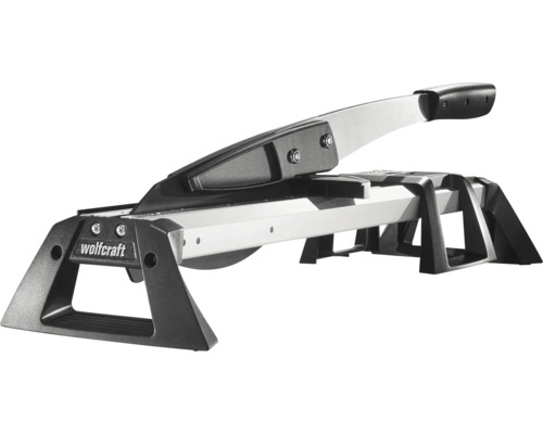 Rezačka laminátu Wolfcraft z kovu a plastu v striebornej a čiernej farbe s rukoväťou a stabilným rámom.