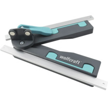 Pokosová uhlová šablóna Wolfcraft s výsuvnými kovovými lištami a aretačnou páčkou.