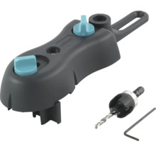 Sada Wolfcraft Undercover Jig obsahujúca vŕtaciu šablónu, stupňovitý vrták s hĺbkovým dorazom a imbusový kľúč pre skryté skrutkové spoje.