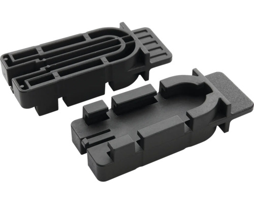 Dva čierne plastové montážne prvky obdĺžnikového tvaru s drážkami a vodiacimi lištami na montáž nábytku alebo okien.