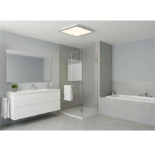 Moderná kúpeľňa s umývadlom, zrkadlom, sprchou a vaňou