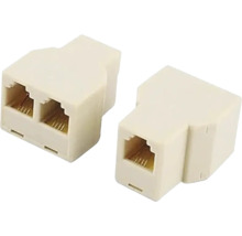 Dva telefónne adaptéry na pripojenie telefónov