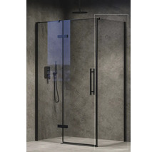 Sprchovací kút so sklenenými dverami a armatúrami pred stenou