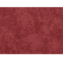 Detailný záber červeného koberca s jemnou textúrou.