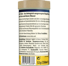 Zadná strana balenia vločkového krmiva pre ryby Tetra TetraMin s informáciami o produkte, zložením a čiarovým kódom.