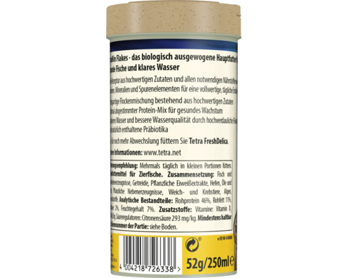 Zadná strana balenia vločkového krmiva pre ryby Tetra TetraMin s informáciami o produkte, zložením a čiarovým kódom.