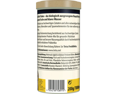Zadná strana dózy s krmivom pre ryby TetraMin Flakes so zložením, analytickými zložkami a odporúčaným kŕmením.
