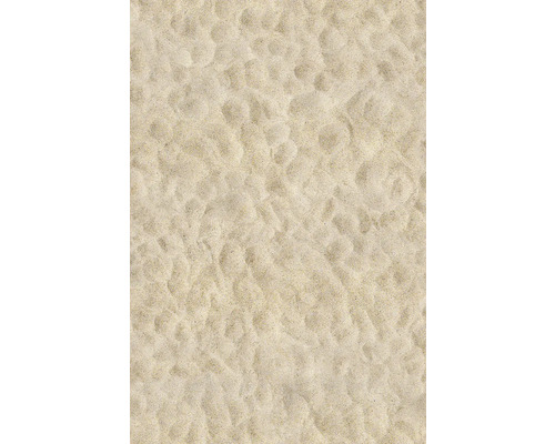 Detailný záber textúry jemnozrnného piesku s nerovným povrchom.