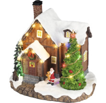 Vianočná dedinka miniatúra so zasneženým domčekom, osvetleným stromčekom, figúrkou Santa Clausa a svetelnou reťazou.