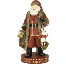 Vianočná figúrka Santa Claus s medvedíkom vo vreci a marionetou, červená s kožušinovým lemom na podstavci.