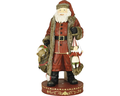 Vianočná figúrka Santa Claus s medvedíkom vo vreci a marionetou, červená s kožušinovým lemom na podstavci.