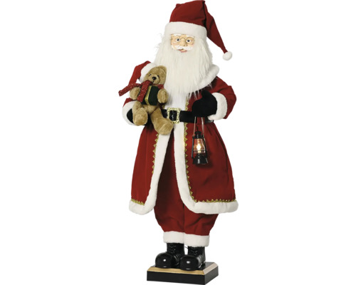 Vianočná figúrka stojaci Santa Claus s medvedíkom a osvetleným lampášom v červenom rúchu s bielym kožušinovým lemom.