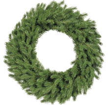 Jedľový veniec zo zelených vetiev, okrúhly a hustý, nezdobený adventný veniec.