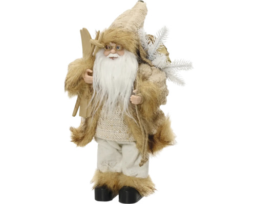 Vianočná dekoratívna figúrka Santa Clausa s bielymi fúzmi, kožuchom, lyžami a vrecom s jedľovými vetvičkami.