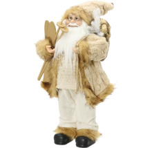 Dekoratívny Santa Claus s lyžami, palicami a vrecom, béžový kabát s umelou kožušinou, biele nohavice, čierne topánky.