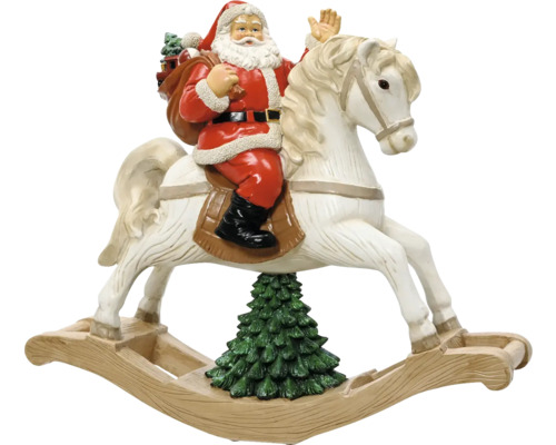 Vianočná figúrka Santa Claus na bielom hojdacom koníkovi nad vianočným stromčekom