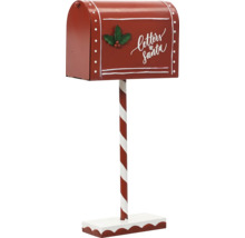Červená vianočná poštová schránka na pruhovanej tyči s nápisom Letters to Santa a ozdobou cezmíny.