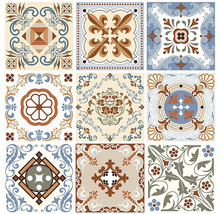 Deväť dekoratívnych dlaždíc s rôznymi vintage vzormi, kvetinovými ornamentmi a geometrickými vzormi.