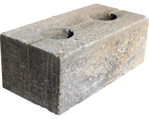 Obdĺžniková murovacia tvarovka z betónu so štruktúrovaným povrchom a dvoma kruhovými priehlbinami na hornej strane.