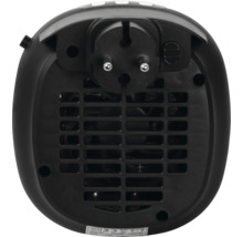Zadný pohľad na čierny kompaktný teplovzdušný ventilátor do zásuvky s integrovanou zástrčkou a ventilačnou mriežkou.