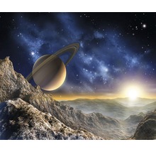 Zobrazenie planéty Saturn nad skalnatou krajinou