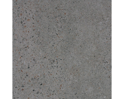 Detail betónovej dlaždice so škvrnitým povrchom