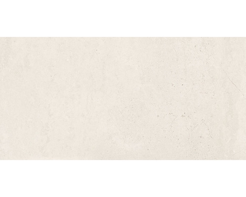 Svetlá podlahová dlaždica s matným povrchom.