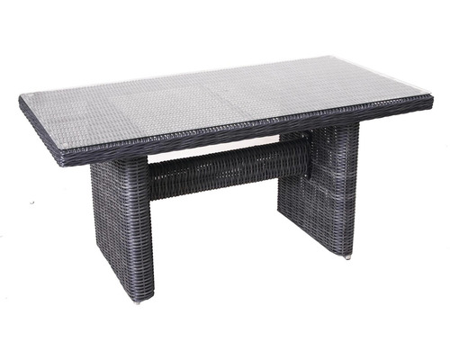 Záhradný stôl so sklenenou doskou a vzhľadom ratanu