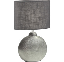 Stolná lampa s okrúhlym tienidlom a vzorovaným povrchom