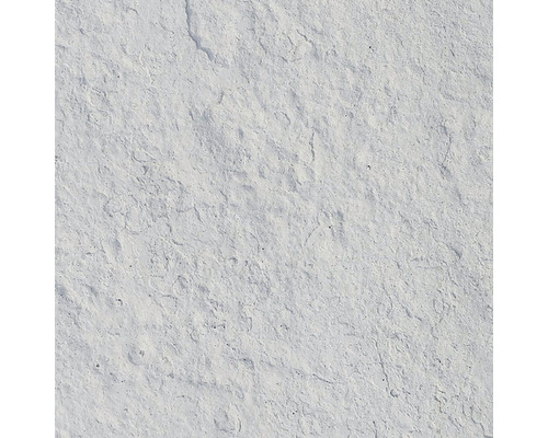 Detail svetlého kamenného povrchu s hrubou textúrou