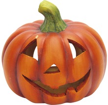 Halloweenska tekvicová lampa s vyrezávanou tvárou