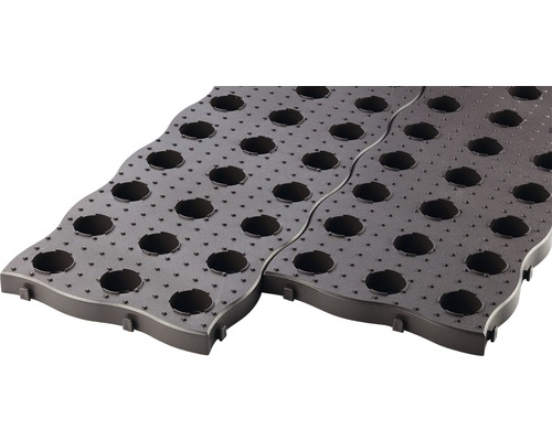 Plastová podlahová doska s otvormi