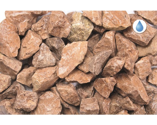 Dekoratívne okrasné kamene do záhrady so symbolom odtoku vody.